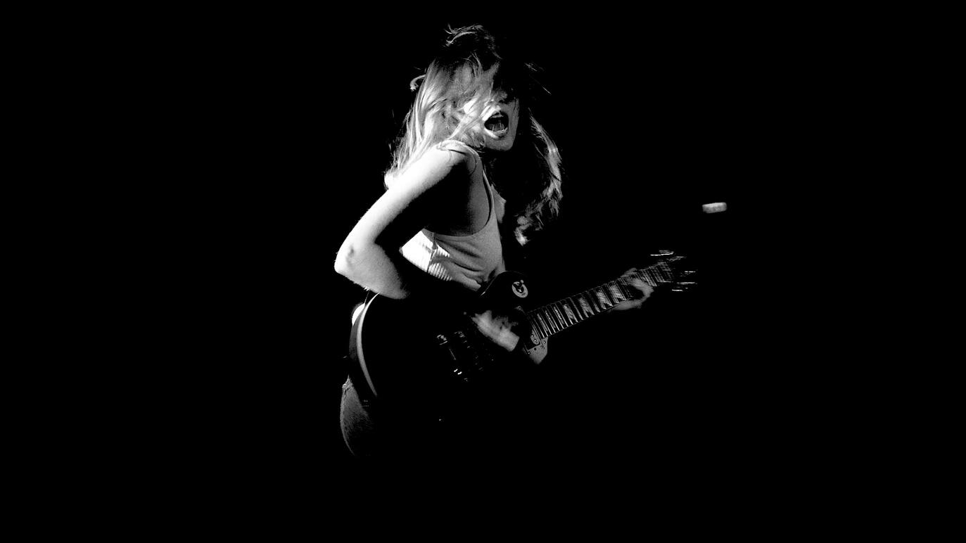 Jerry Williams with a guitar in Black and White